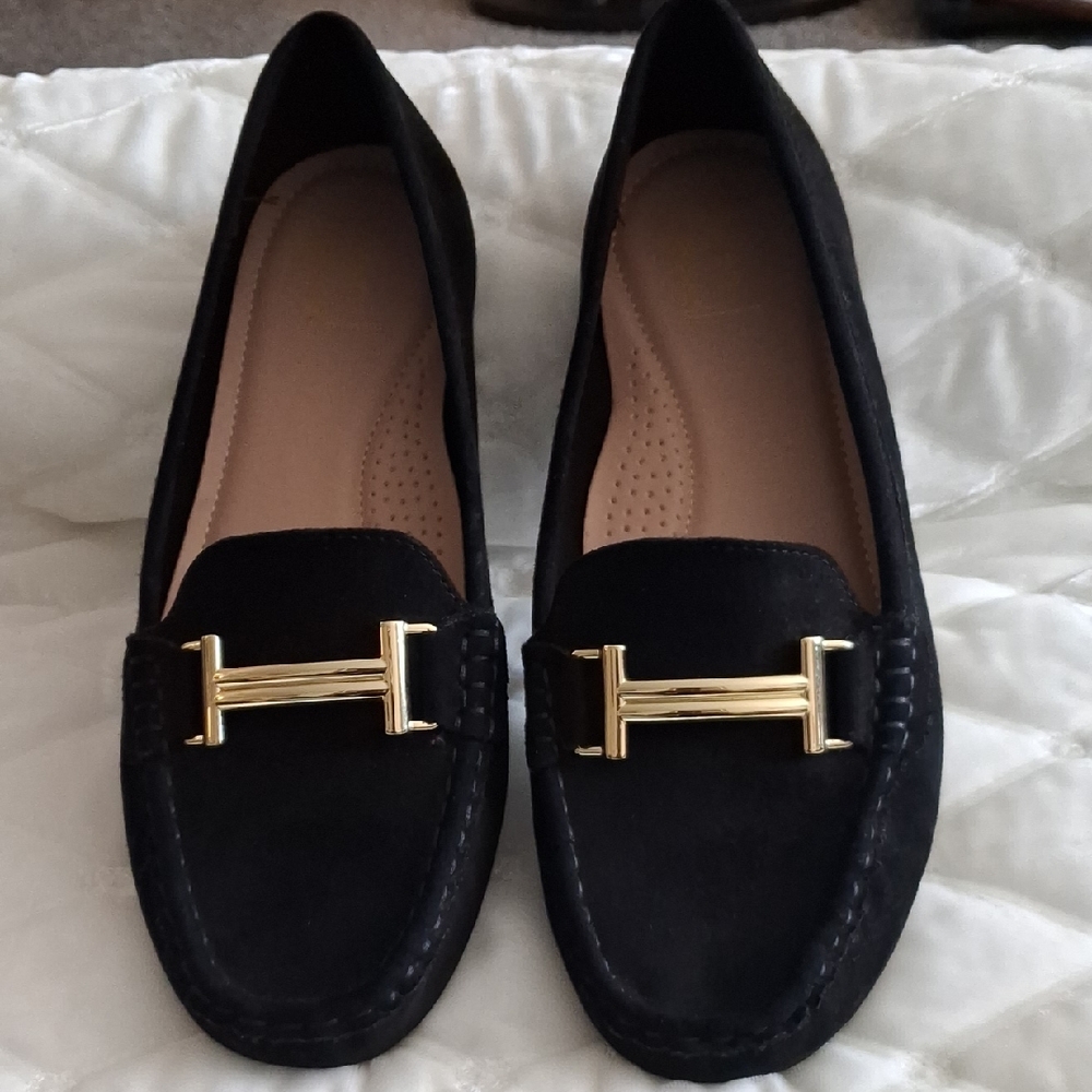 Chic Black Loafers with Gold Detail
